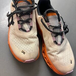 On Running Cream and Orange Cloud Sneakers